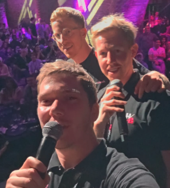 HonestBrands team members taking a selfie at an event.