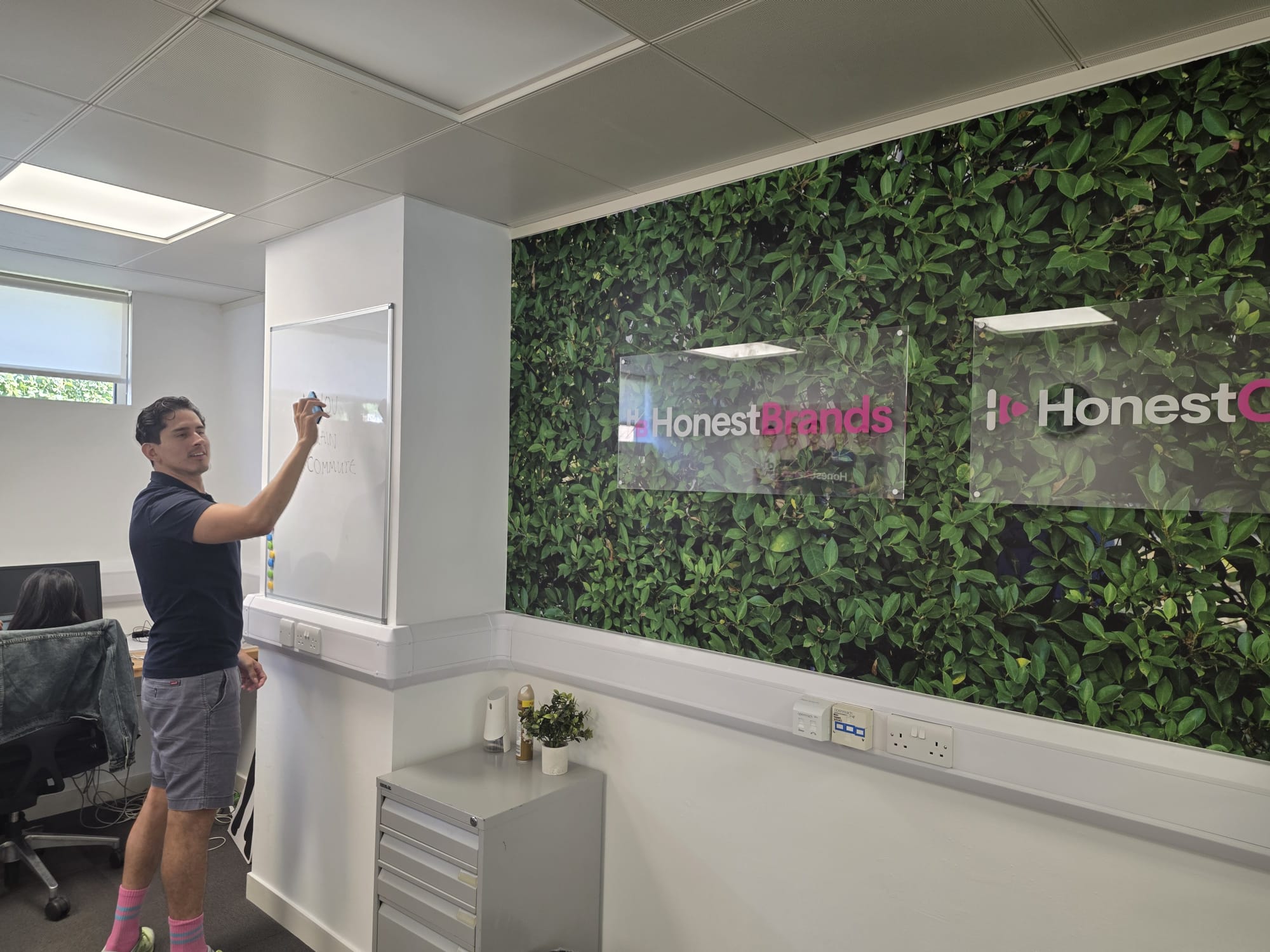 HonestBrands team working in the office.