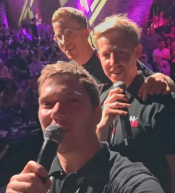 HonestBrands team members taking a selfie at an event.