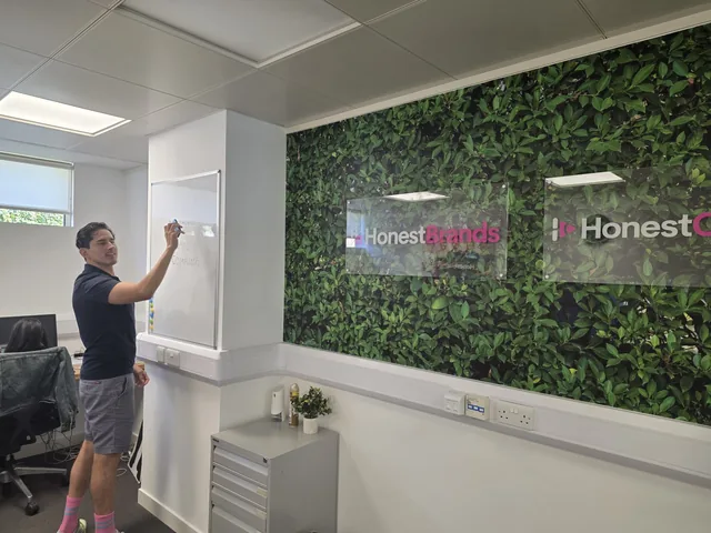 HonestBrands team working in the office.
